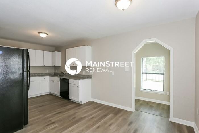 7006 Jay St - Photo 5 of 16