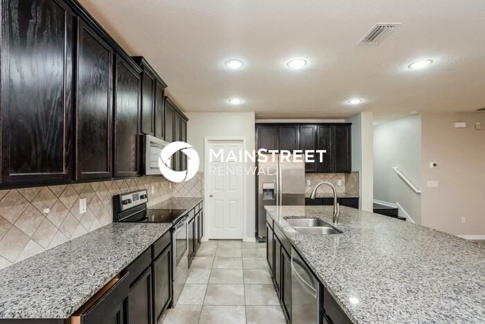 10250 Newminster Loop - Photo 4 of 16