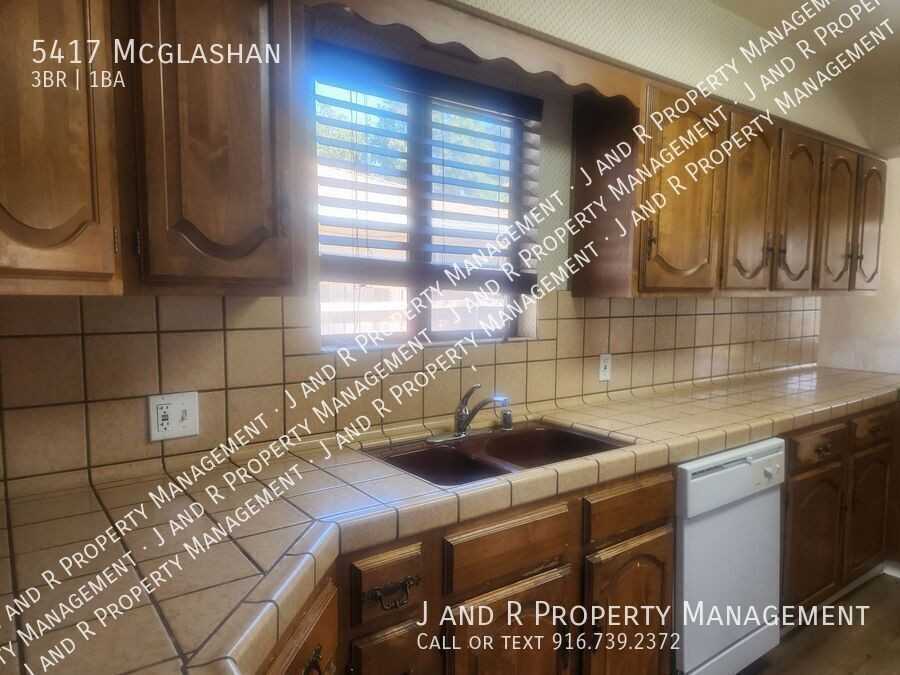 5417 Mcglashan St - Photo 6 of 20