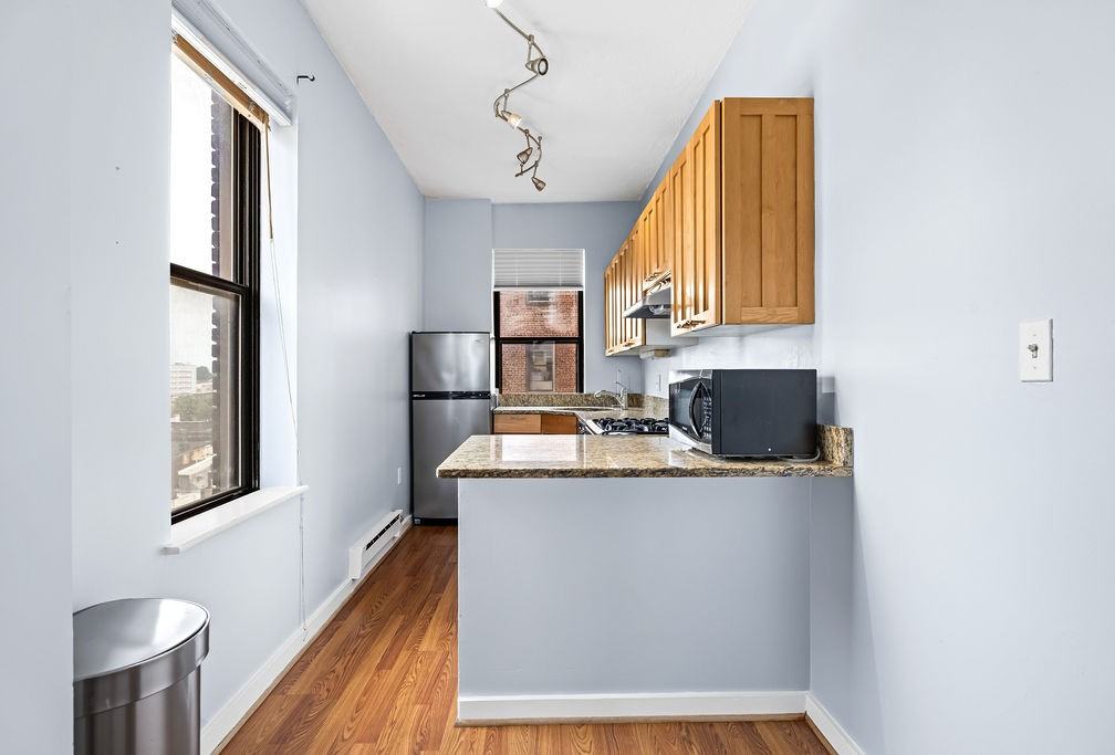 1001 Saint Paul St #8B - Photo 4 of 31