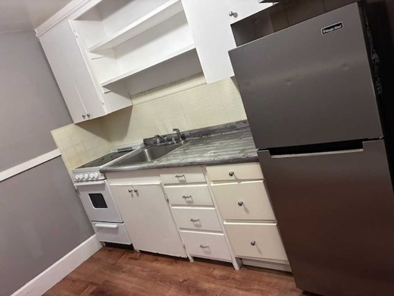 65 Pleasant Street LLC - Photo 4 of 17