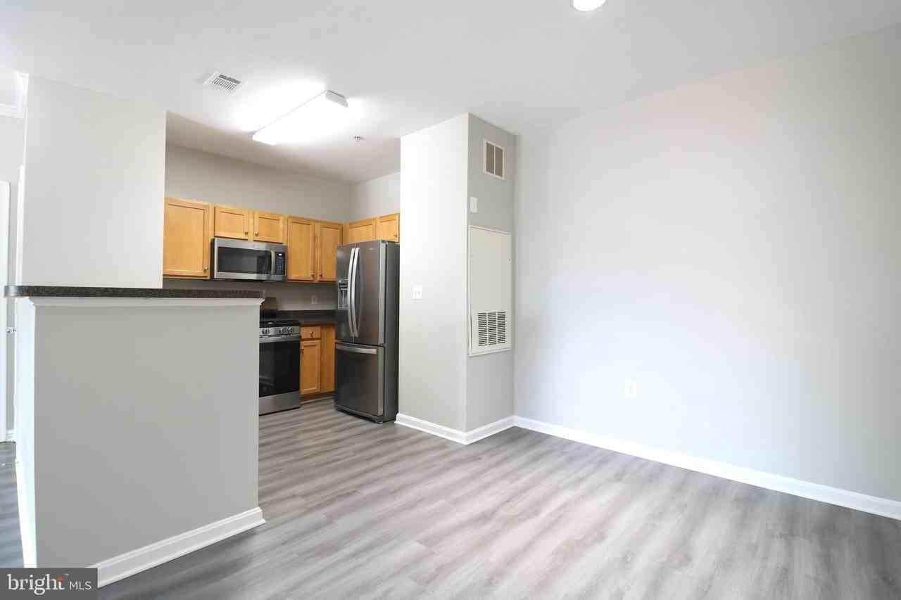 5117 Travis Edward Way Apt E #5117E - Photo 4 of 16