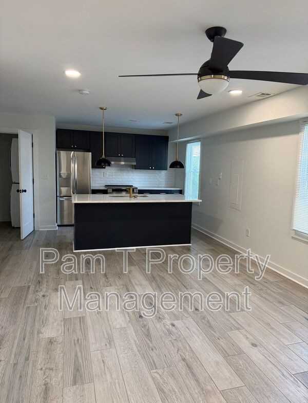 201 W 37th St - Photo 2 of 7