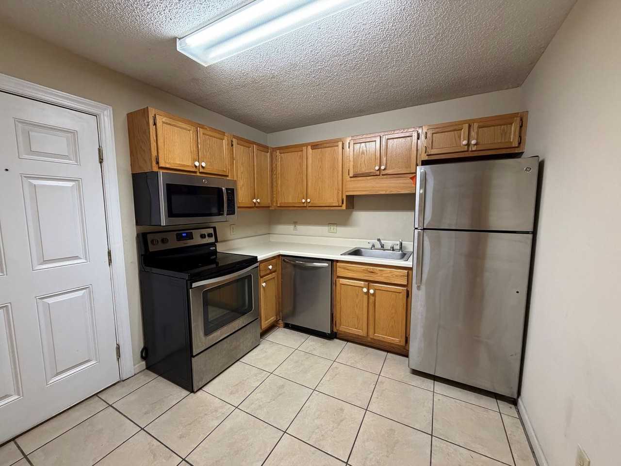 Peak Apartments - Photo 2 of 8