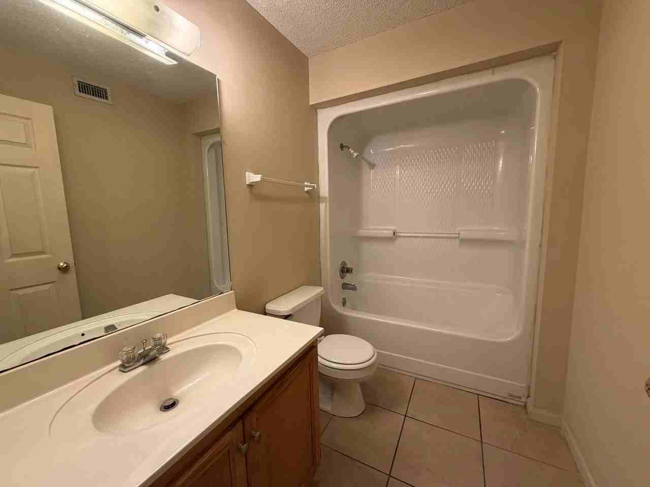 Peak Apartments - Photo 5 of 8