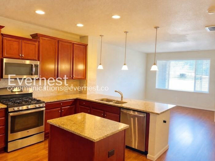 9086 E Phillips Ln - Photo 5 of 14