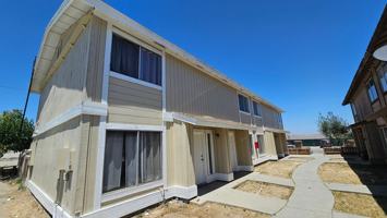 featured image of 211 W Ash St