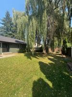 featured image of 720 E Whispering Pines Ln