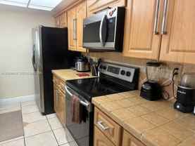 8999 8999 SW 133rd Ct th B - Photo 1 of 1
