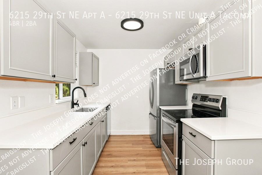 6215 29th St Ne Apt A - Photo 3 of 11