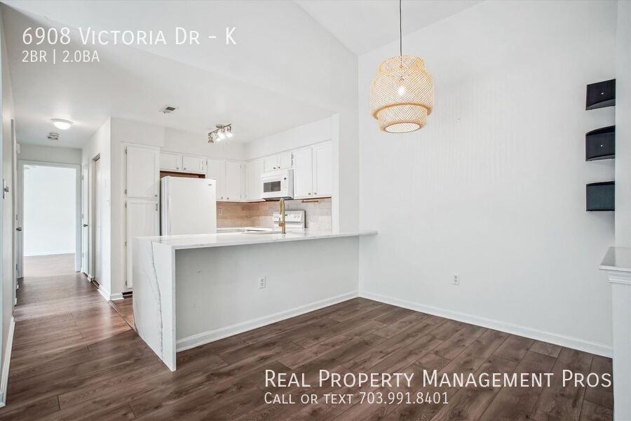 6908 Victoria Dr #K - Photo 7 of 34