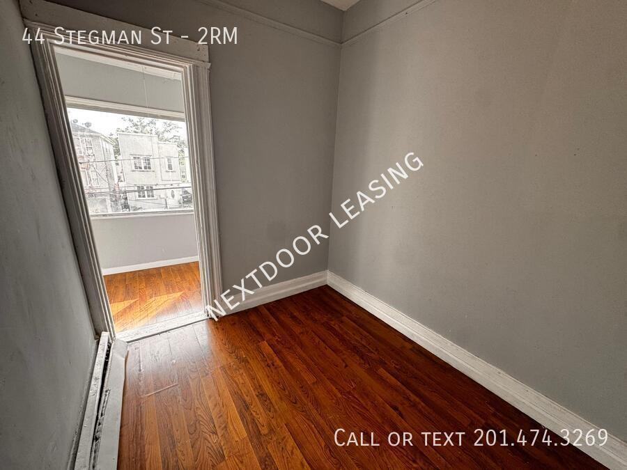 44 Stegman St #2RM - Photo 7 of 7