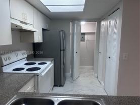 5011 Wiles Rd #207 - Photo 1 of 1