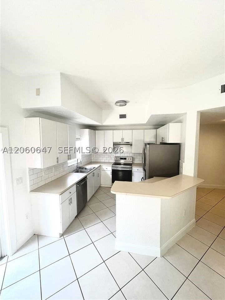 8885 Sw 221st Ter - Photo 2 of 12