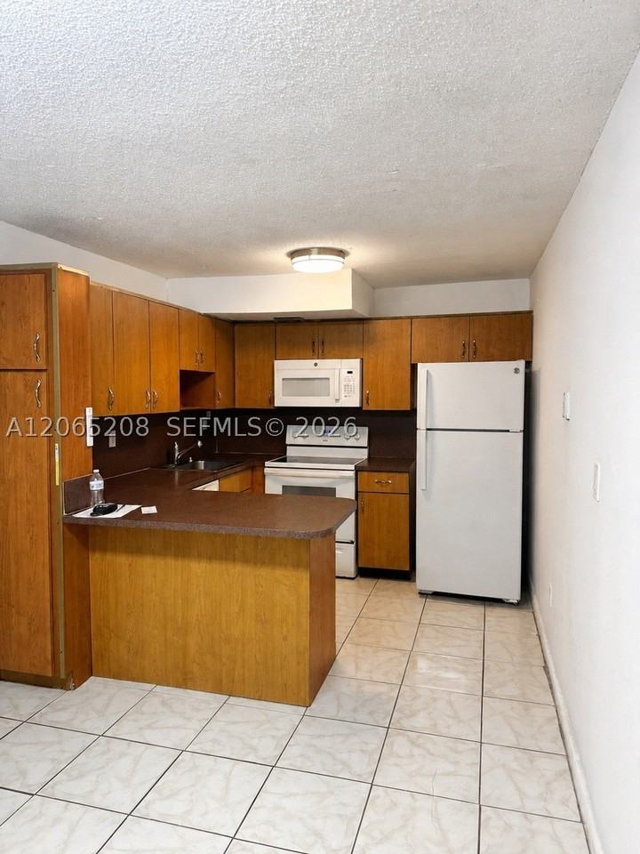 555 Ne 123rd St #215D - Photo 4 of 16