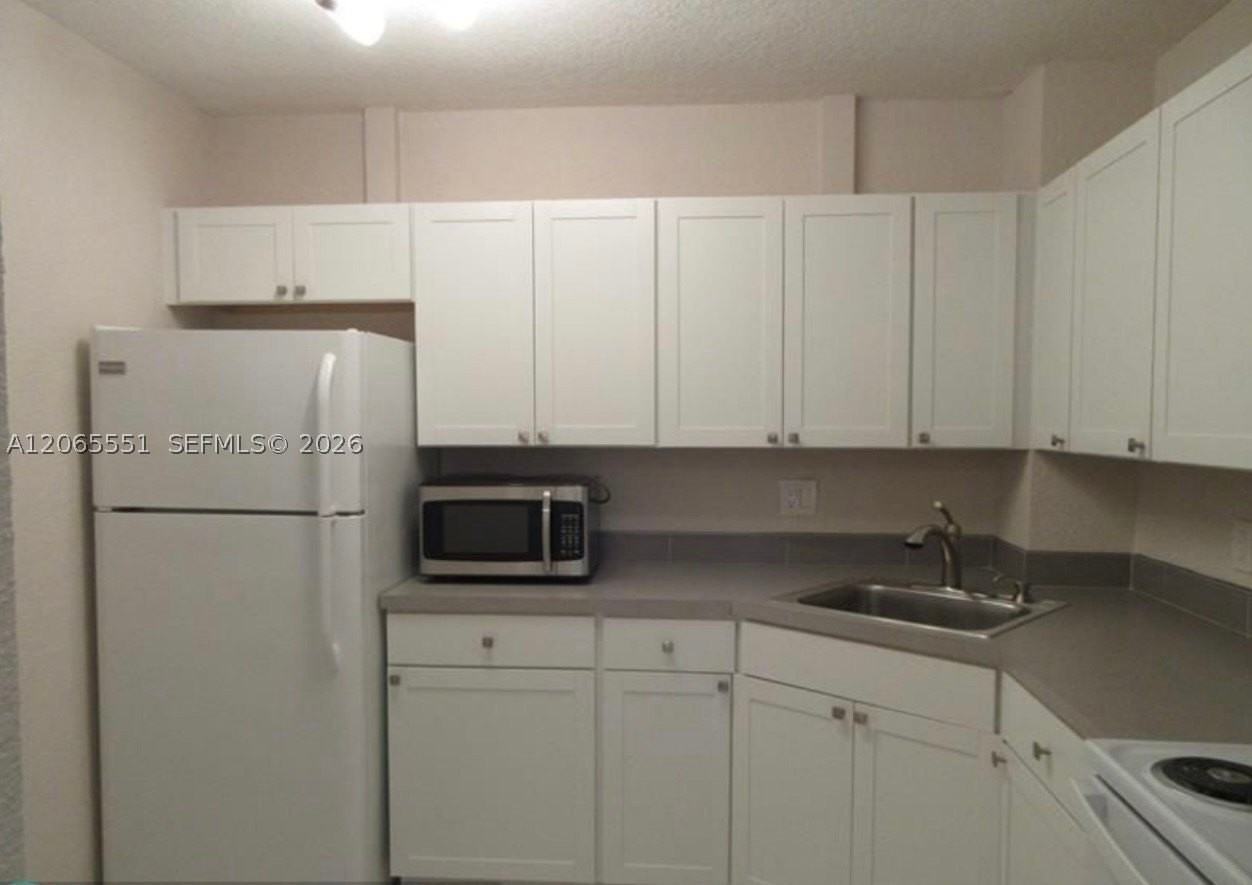 10751 Royal Palm Blvd #17 - Photo 2 of 7