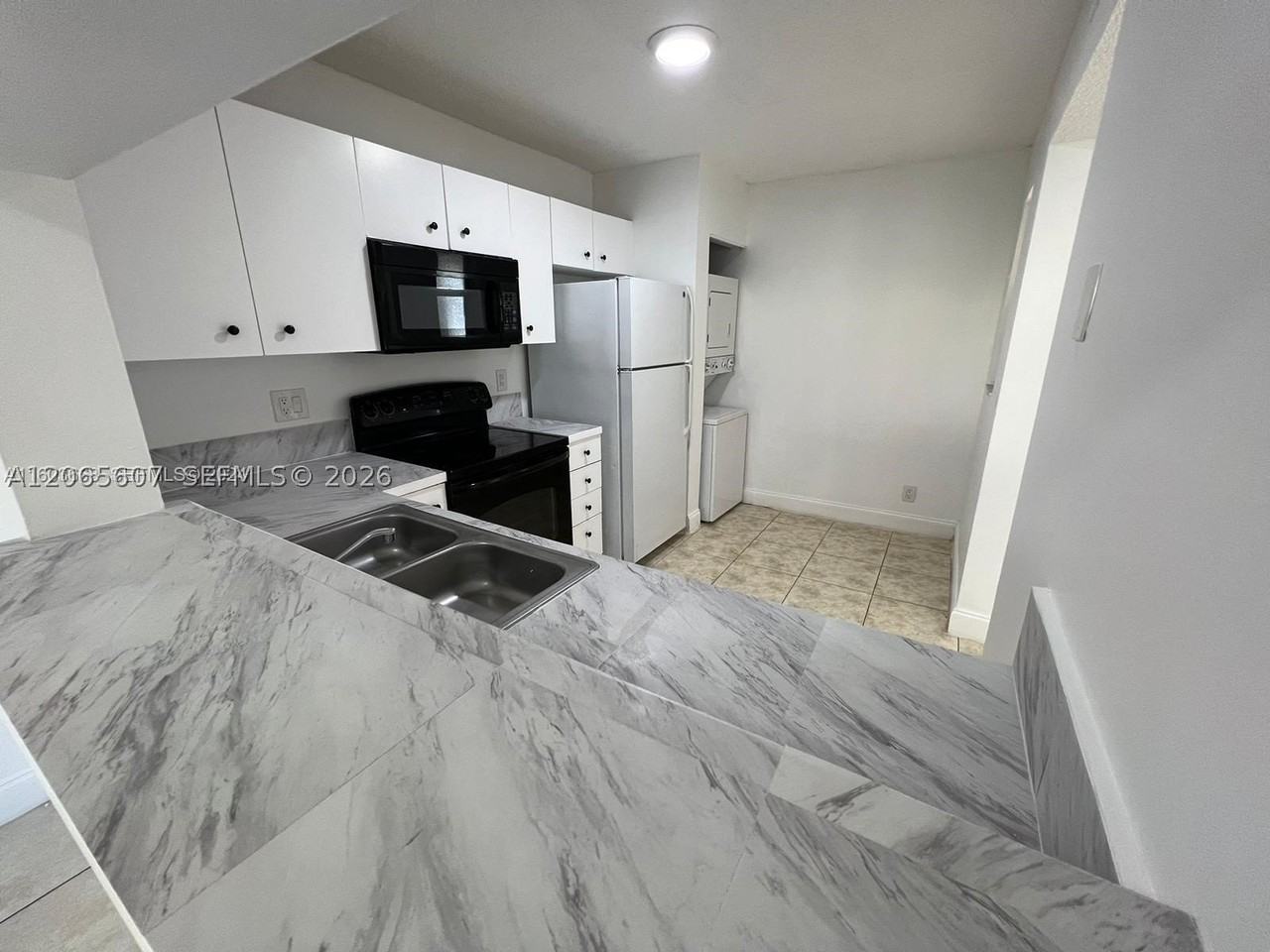 2421 Nw 56th Ave #2-103 - Photo 2 of 9