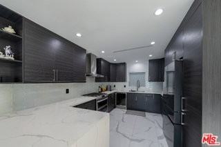 7719 Rhodes Ave - Photo 4 of 8