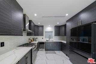 7719 Rhodes Ave - Photo 5 of 8