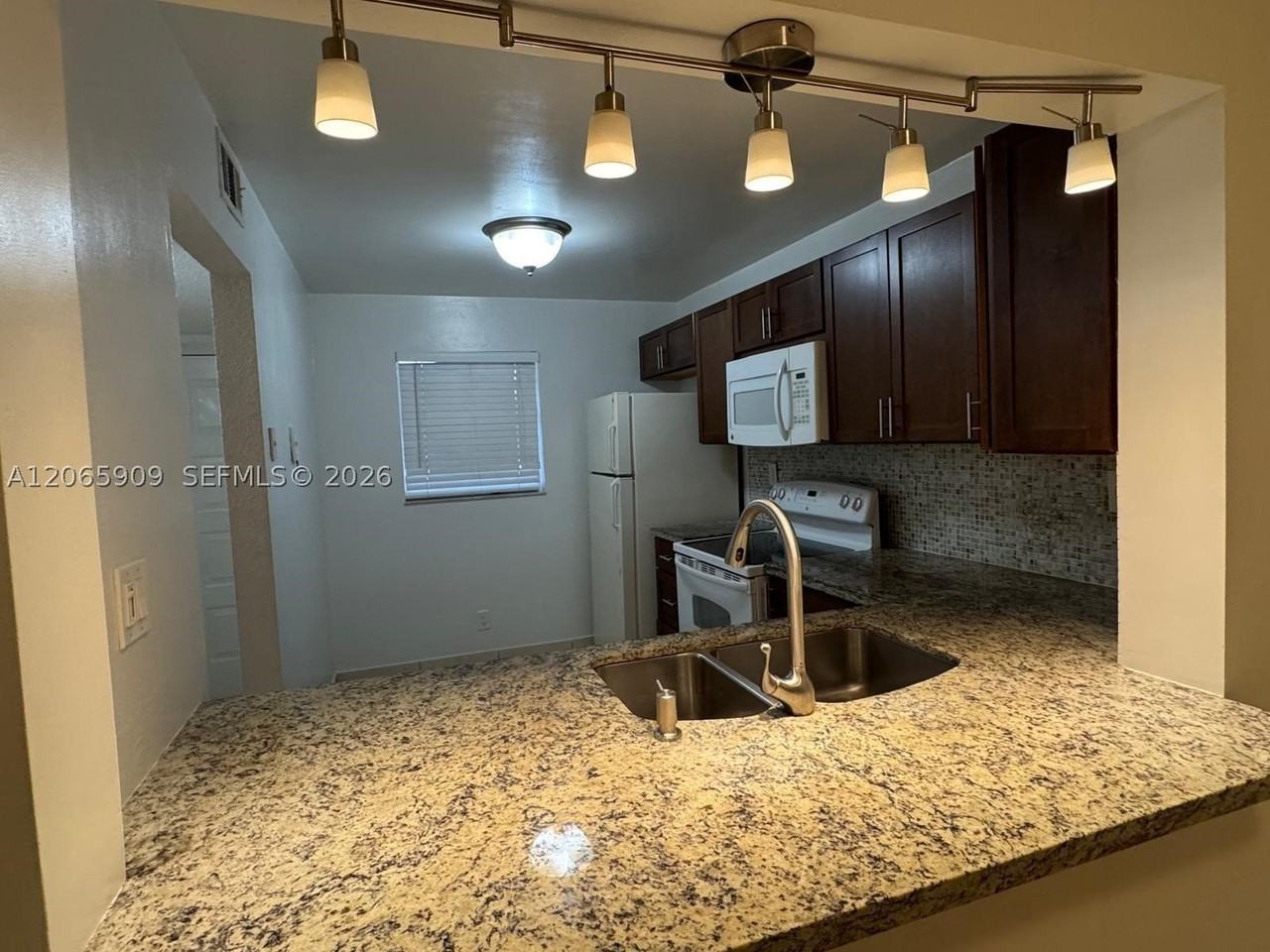 3022 Coral Springs Dr #104-3 - Photo 3 of 14