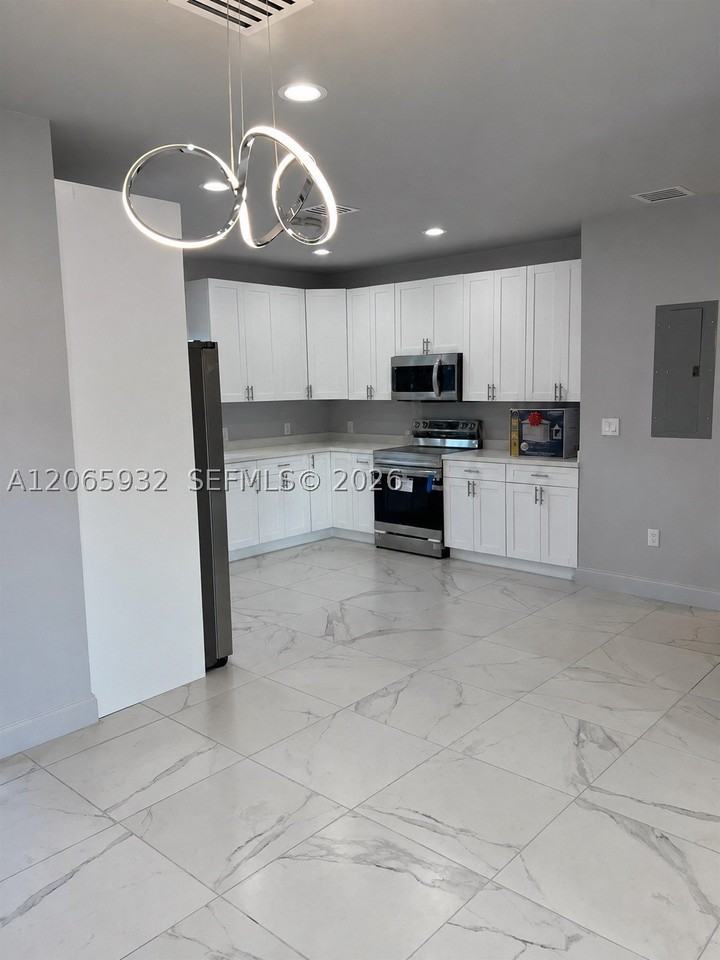 1311 Nw 52nd St #1 - Photo 3 of 9