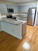 Beautiful 1BR in historic O'Connell School building on Park St in Bristol! - Photo 1 of 1