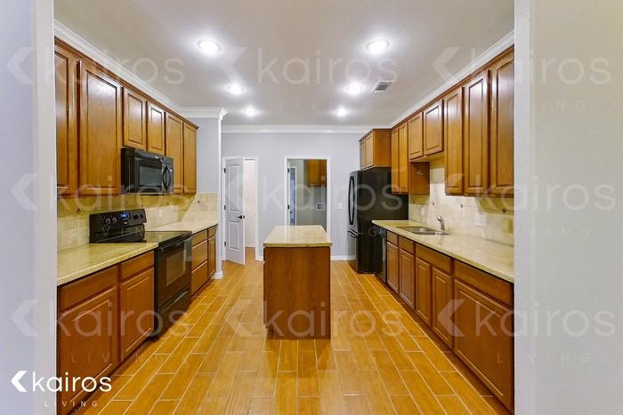 7104 Mosley St - Photo 5 of 21
