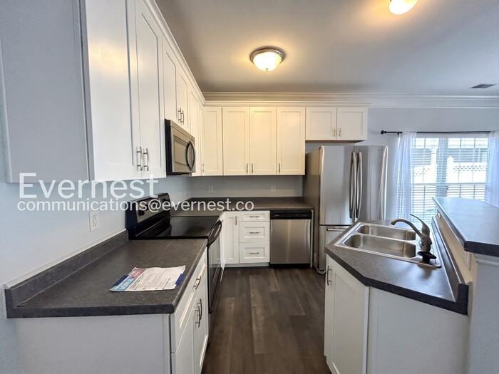7023 Sunnywood Dr - Photo 4 of 26