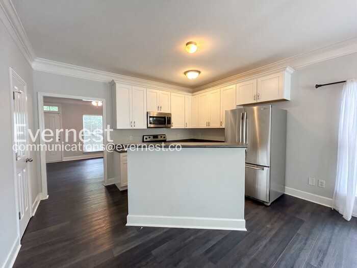 7023 Sunnywood Dr - Photo 5 of 26