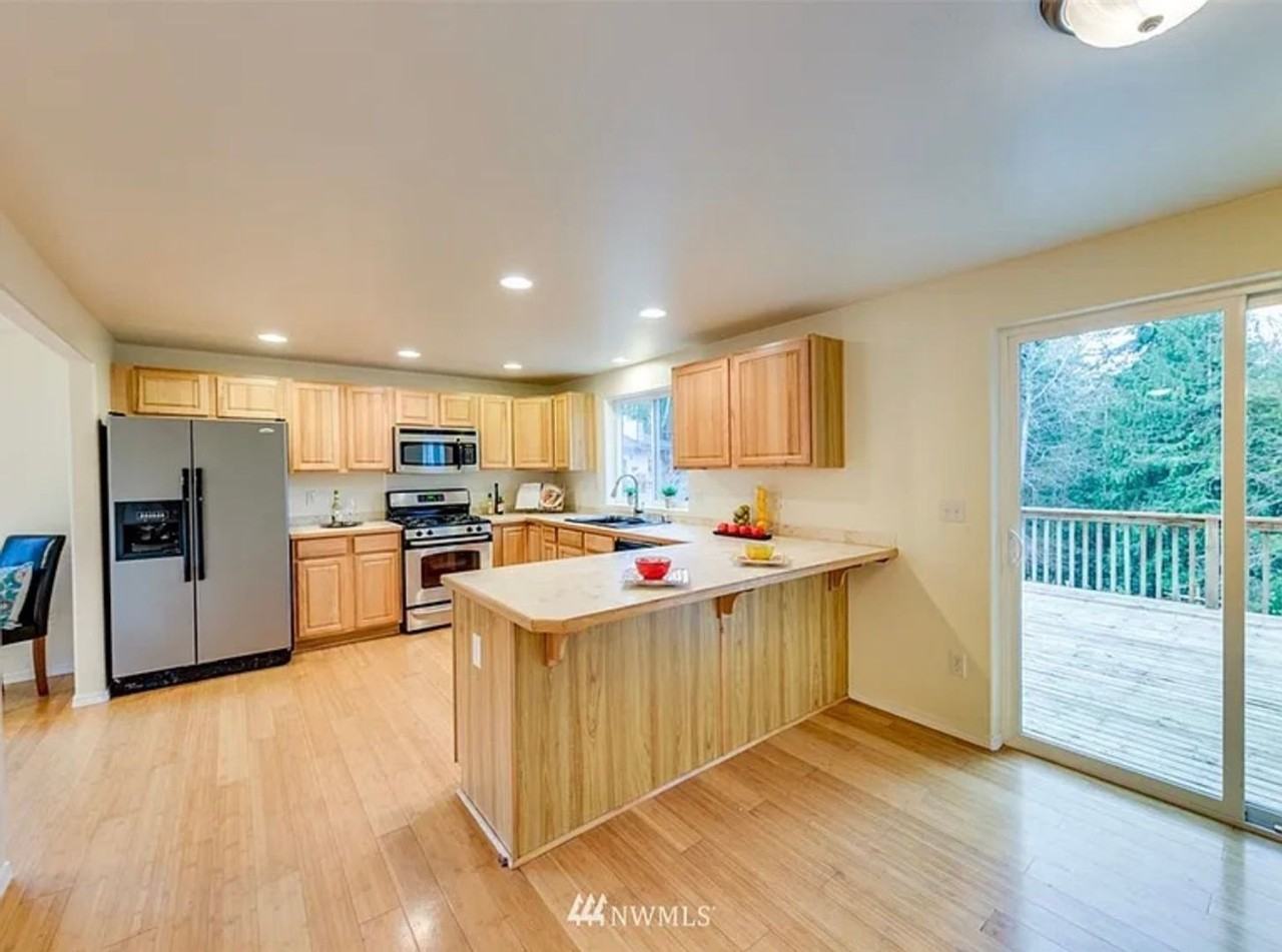 8661 Sungate Pl Ne - Photo 4 of 5