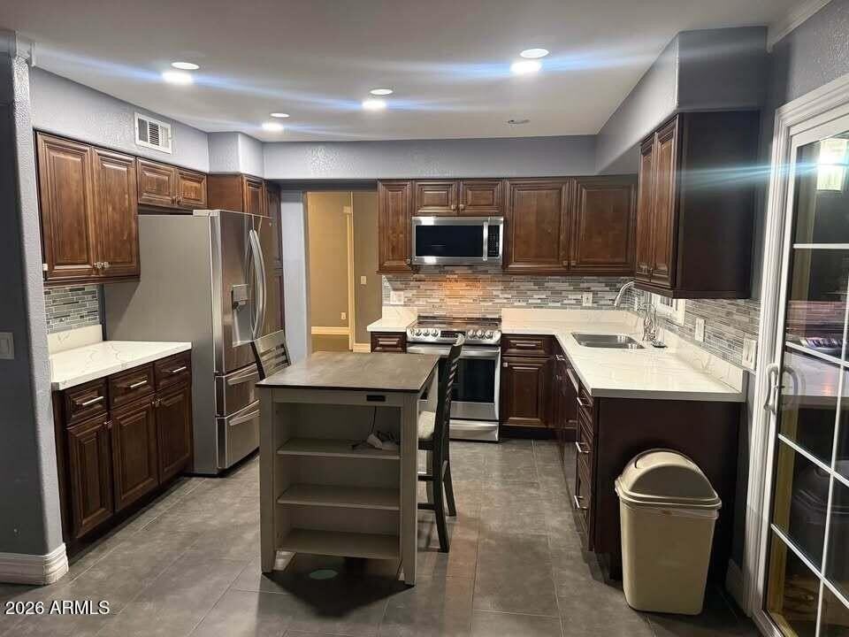 8623 W Cambridge Ave - Photo 7 of 15