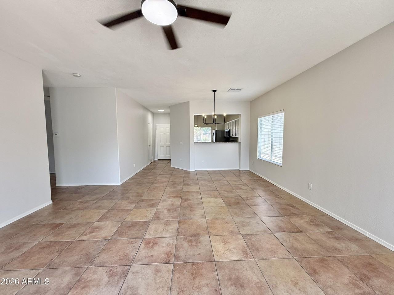 8227 E Osage Ave - Photo 4 of 35