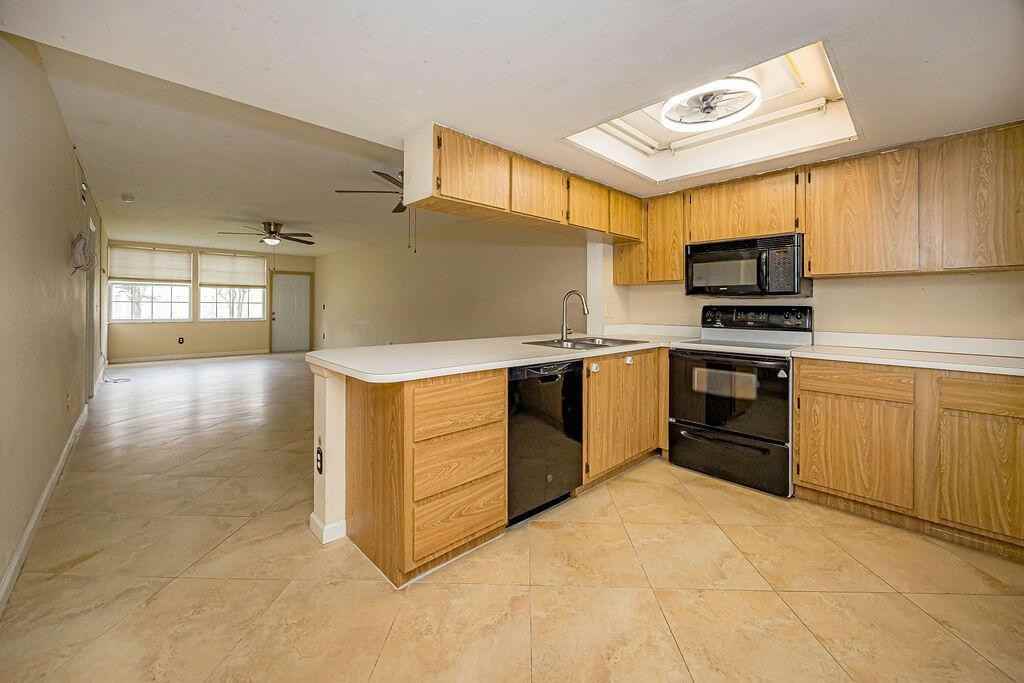1501 Palm Beach Trace Dr #1 - Photo 5 of 6