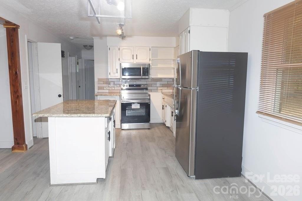 1411 Frederick St - Photo 4 of 26