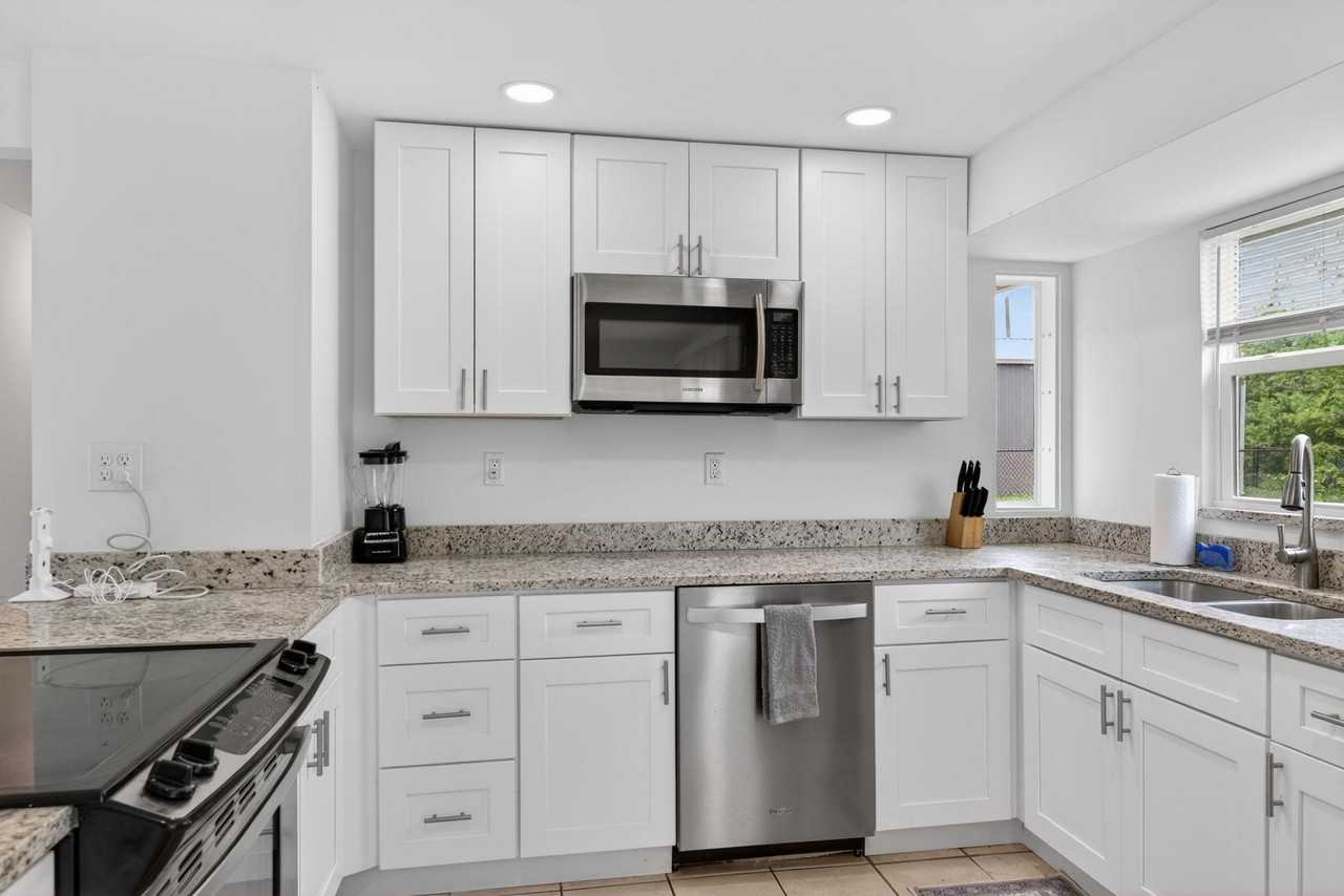 Tropical Ave Nw - Photo 4 of 21