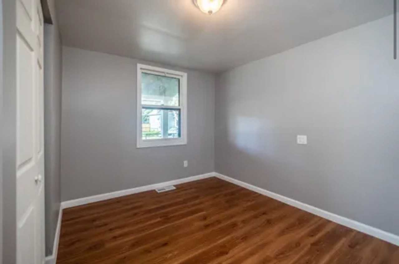 831 Avenue C - Photo 6 of 9