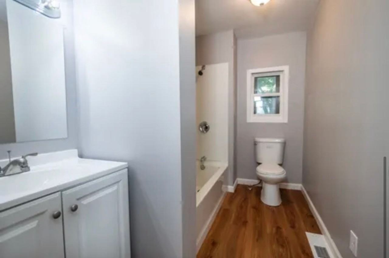831 Avenue C - Photo 7 of 9