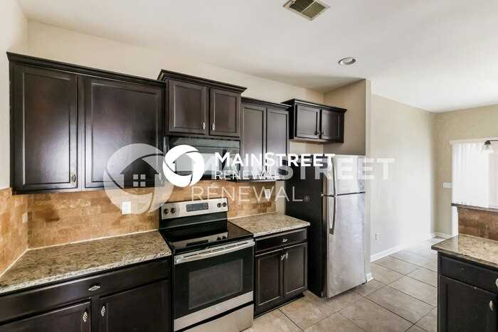 12827 Olmsted Cir - Photo 7 of 15