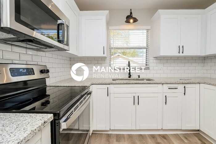 6437 30th Way N - Photo 6 of 16