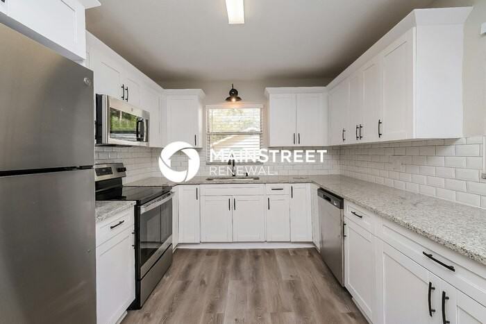 6437 30th Way N - Photo 7 of 16
