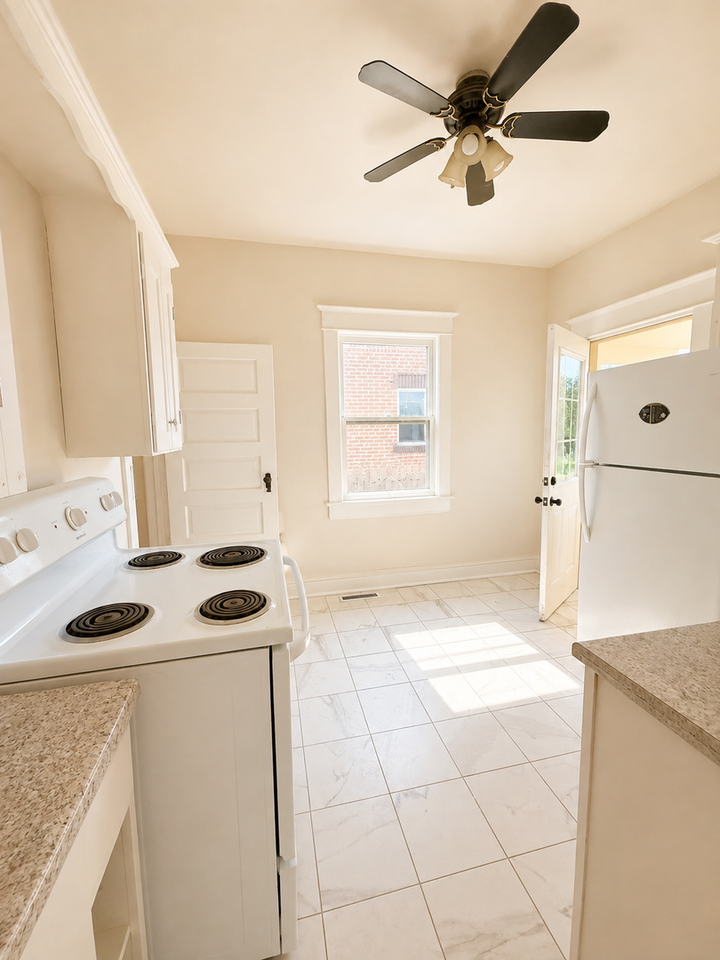 129 N Olive St - Photo 3 of 10