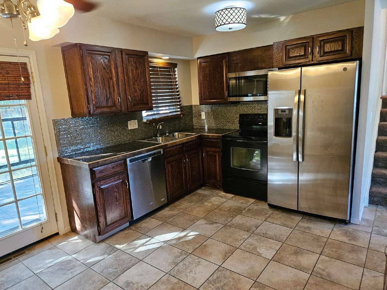 7055 W Fremont Pl - Photo 4 of 29