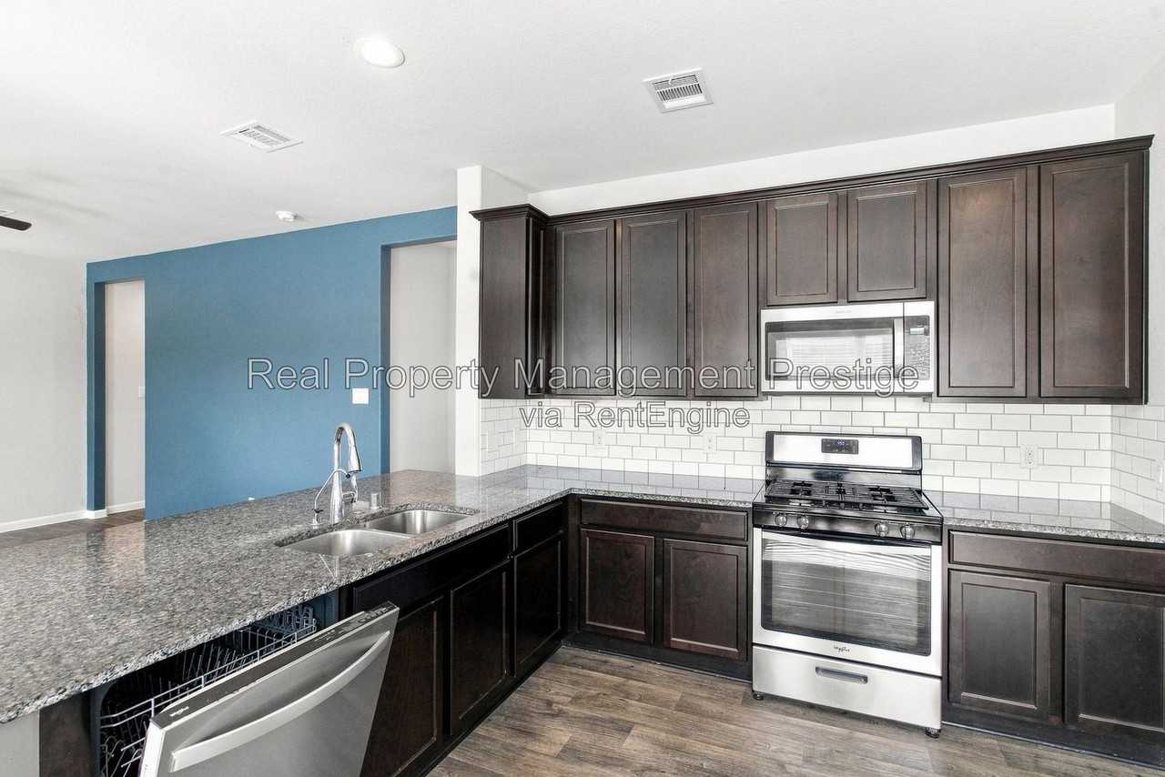 13025 Dancing Reed Dr - Photo 5 of 15