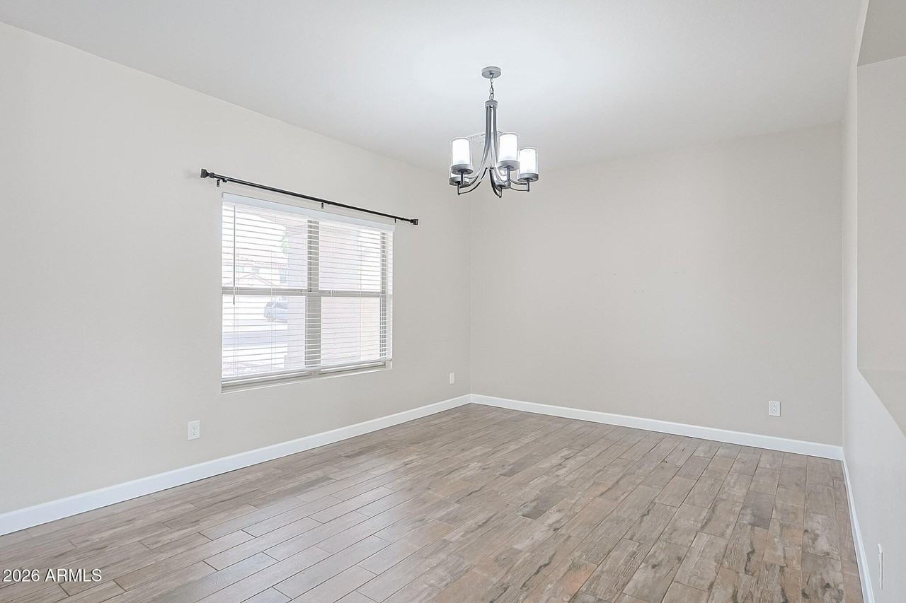 15569 W Gelding Dr - Photo 4 of 46