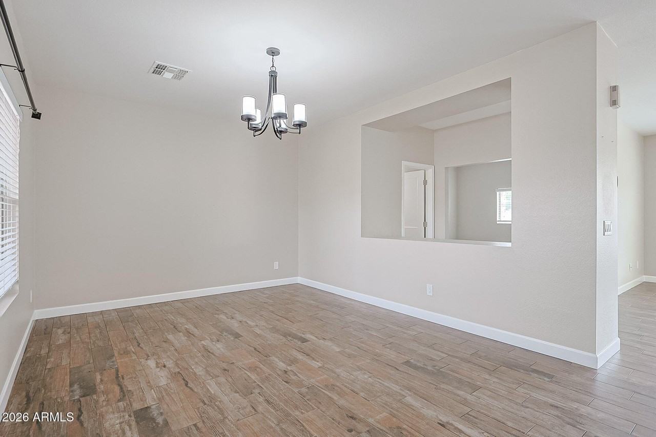 15569 W Gelding Dr - Photo 5 of 46
