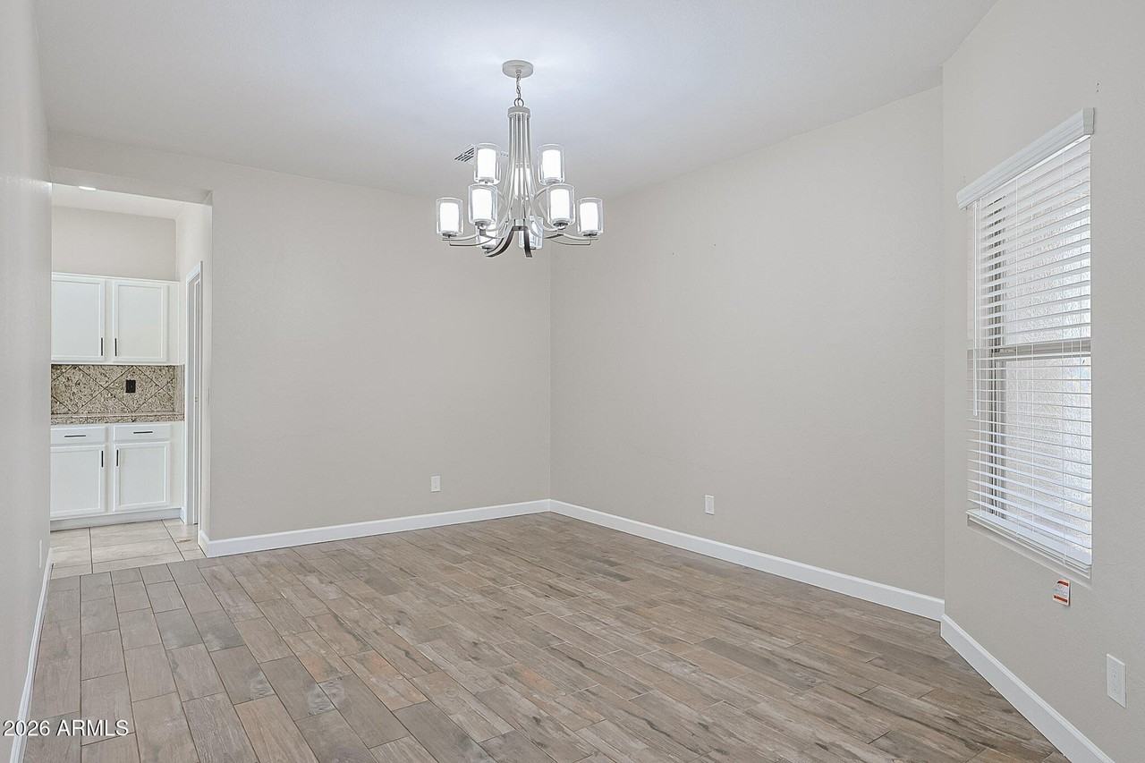 15569 W Gelding Dr - Photo 6 of 46