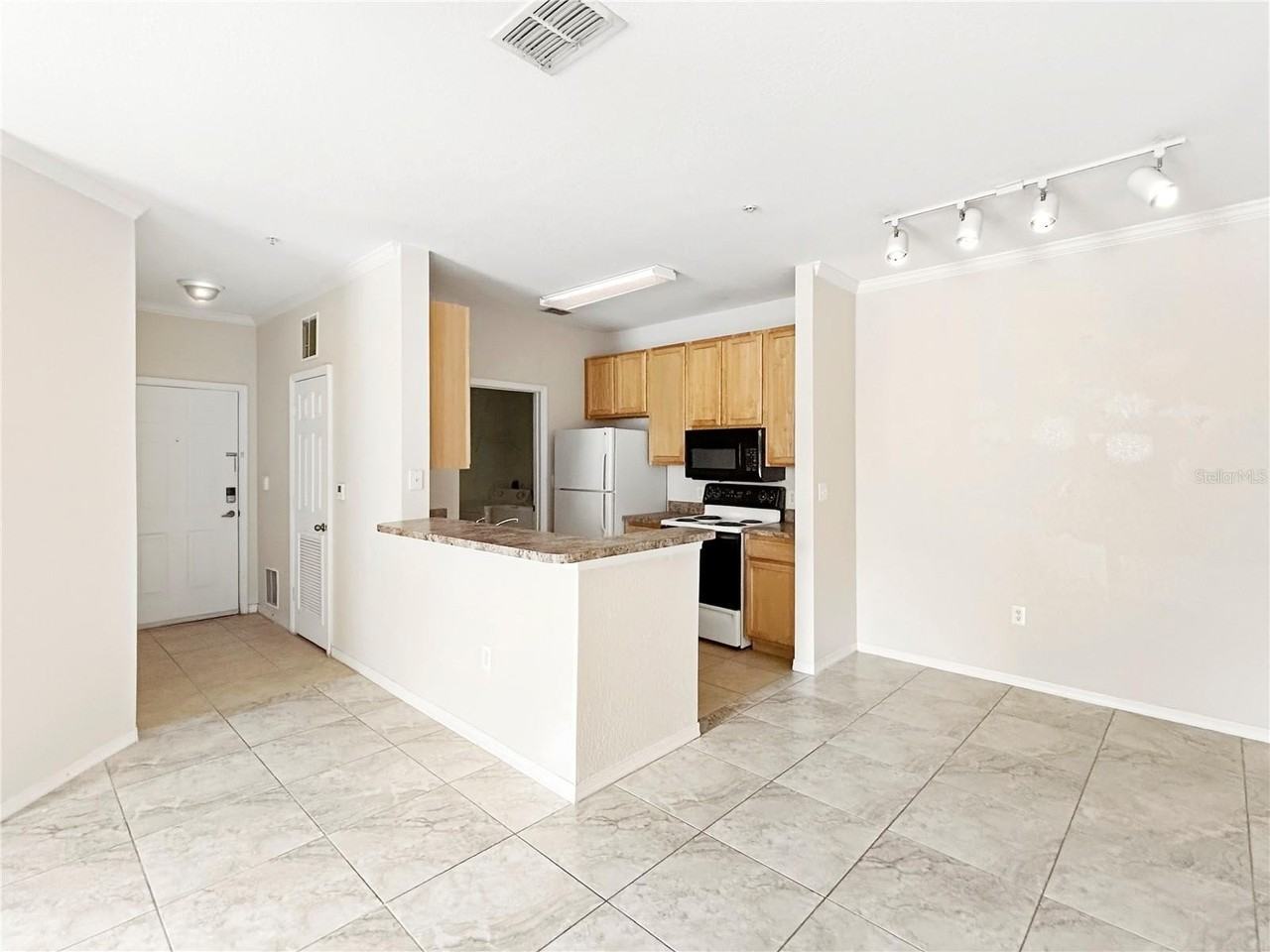 10205 Courtney Palms Blvd #101 - Photo 6 of 30