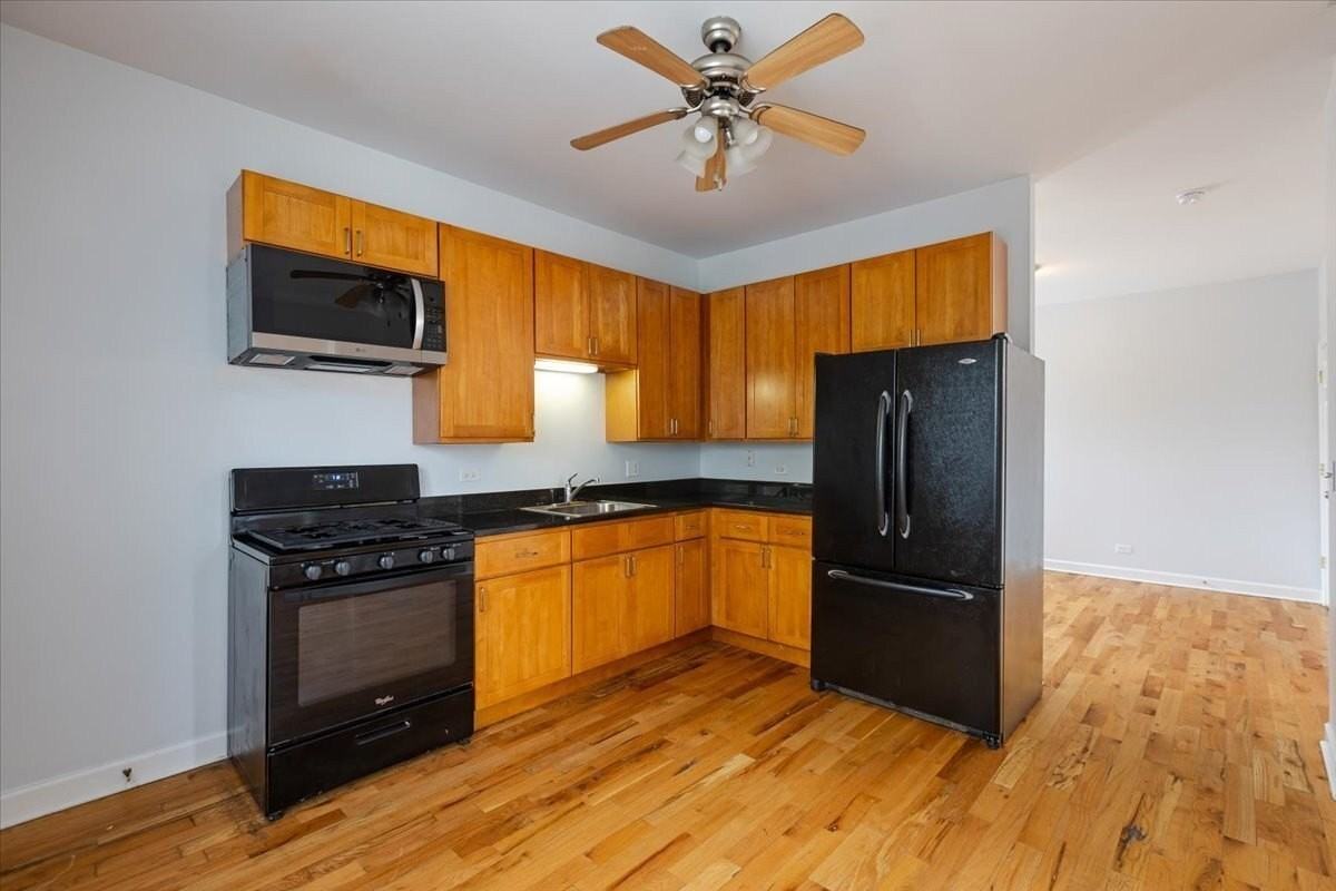 1234 W 49th Pl #2R - Photo 4 of 9