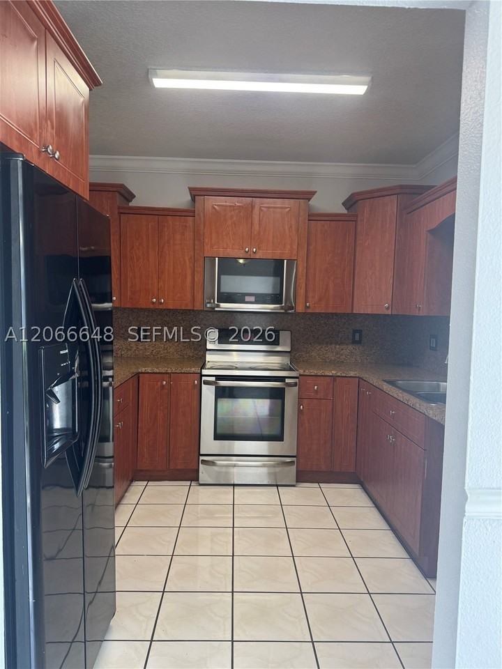 8380 Nw 103rd St #105G - Photo 4 of 28