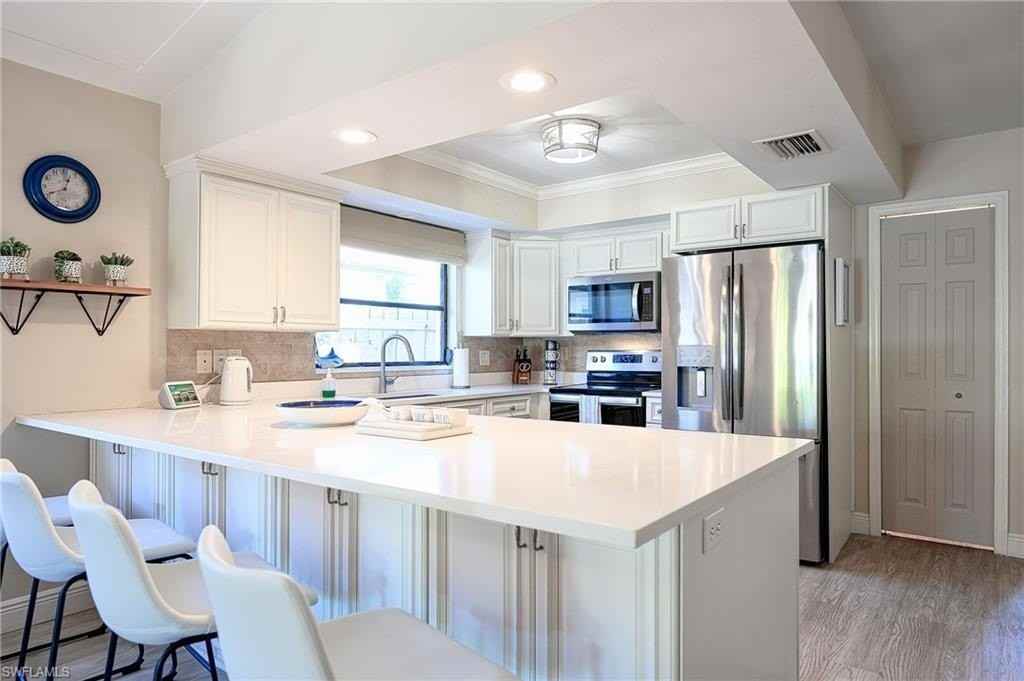 672 100th Ave N - Photo 6 of 35